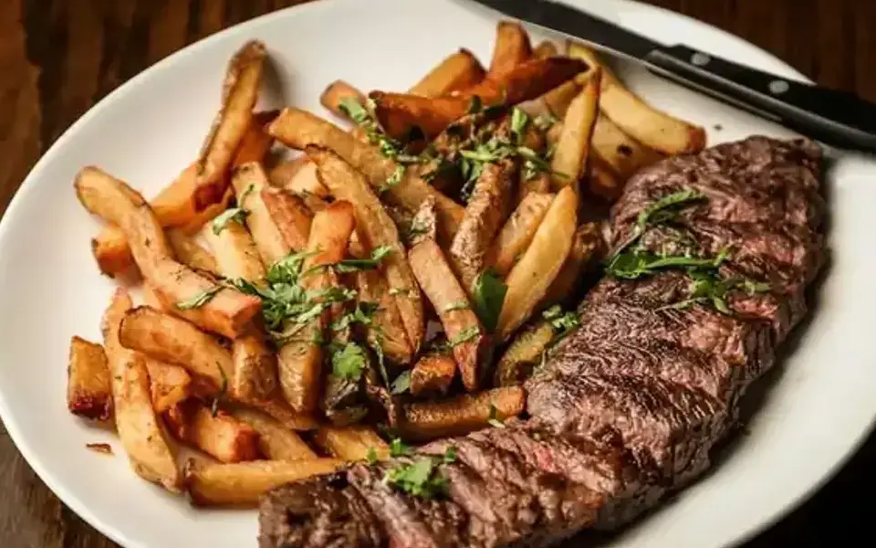 Gheimeh with beef, tomatoes, and potatoes